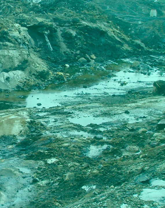 Polluted landfill with contaminated pools